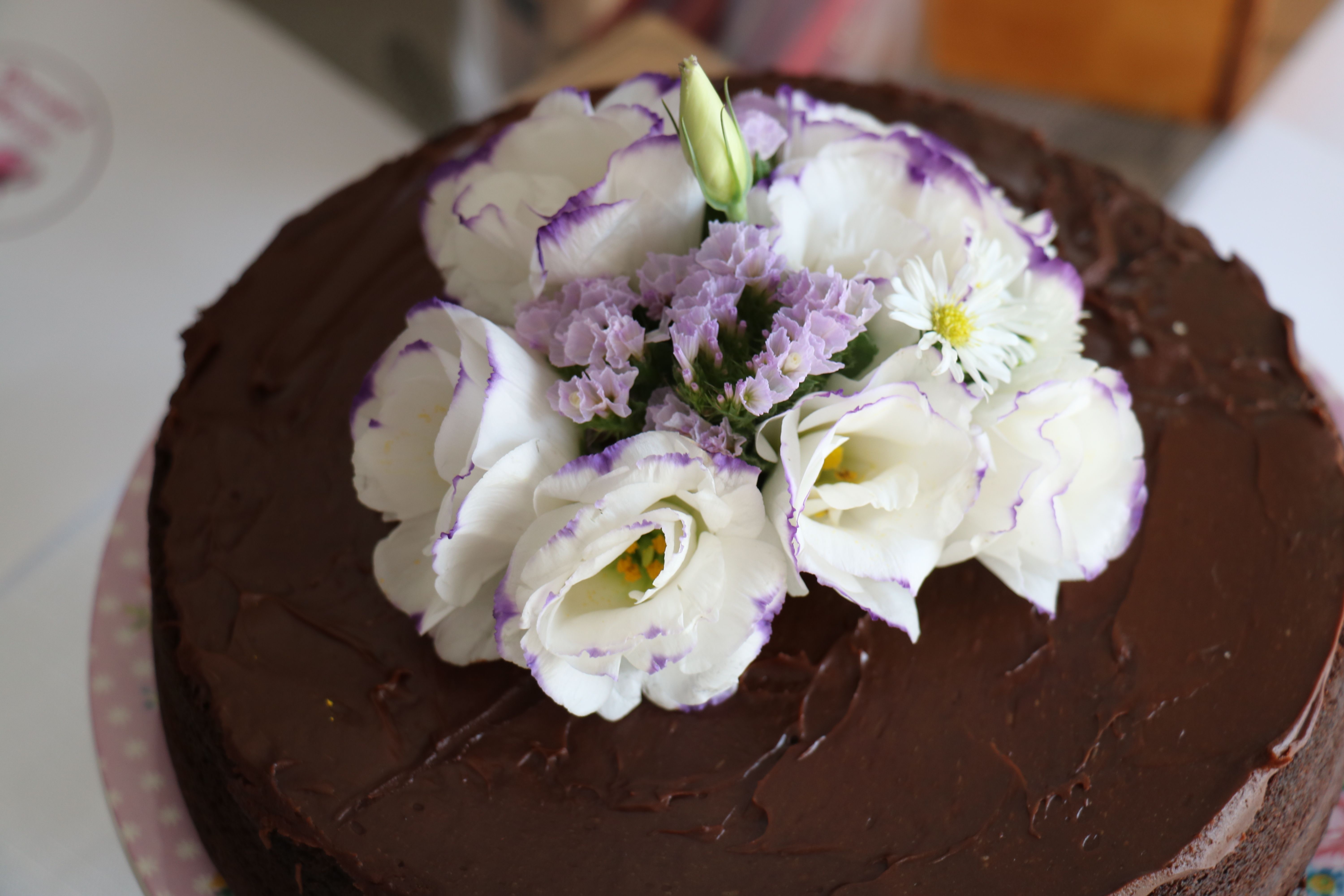 Flowers on chocolate mud cake by Graceful Blooms Mortdale events florist